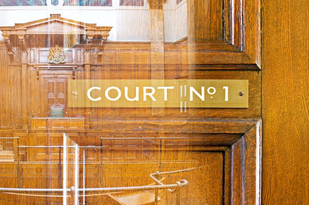 Wood panelling with court room sign