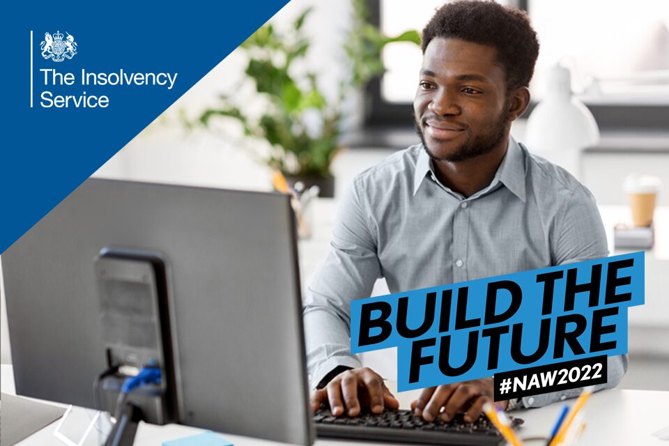 Young apprentice working at their desk on a laptop